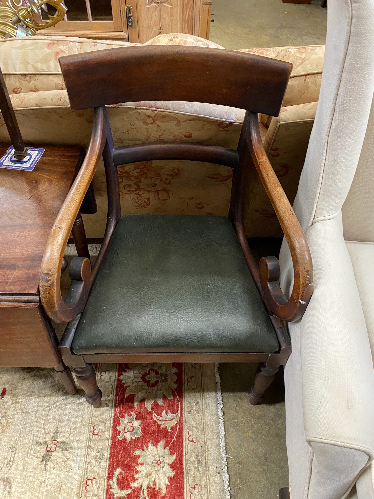 An early Victorian provincial mahogany elbow chair, and Edwardian drop flap table and a Provincial Pembroke table (cut down)